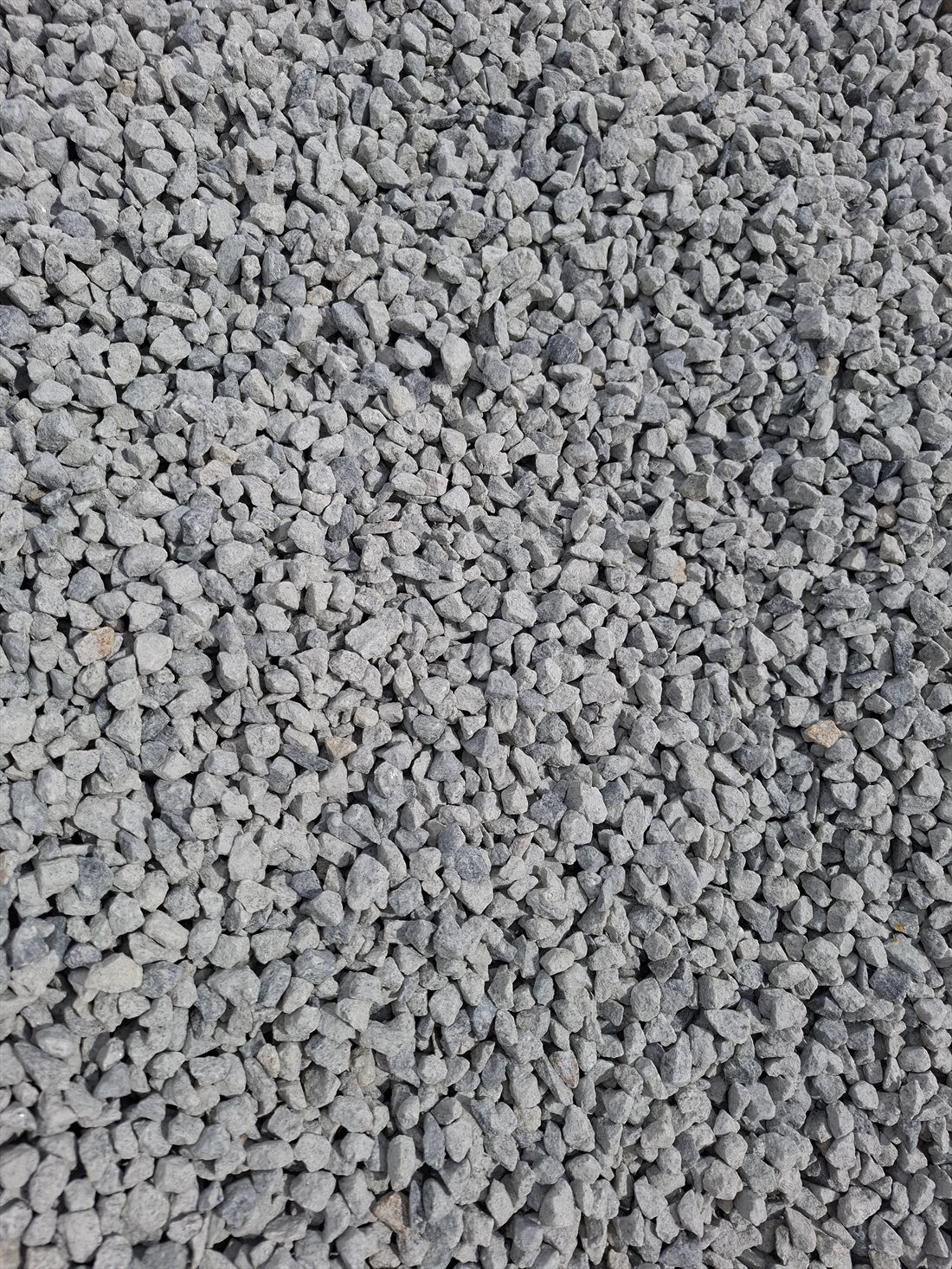 Blue Metal Aggregate (14mm) close up, supplied and delivered across Perth by Red Sand Supplies