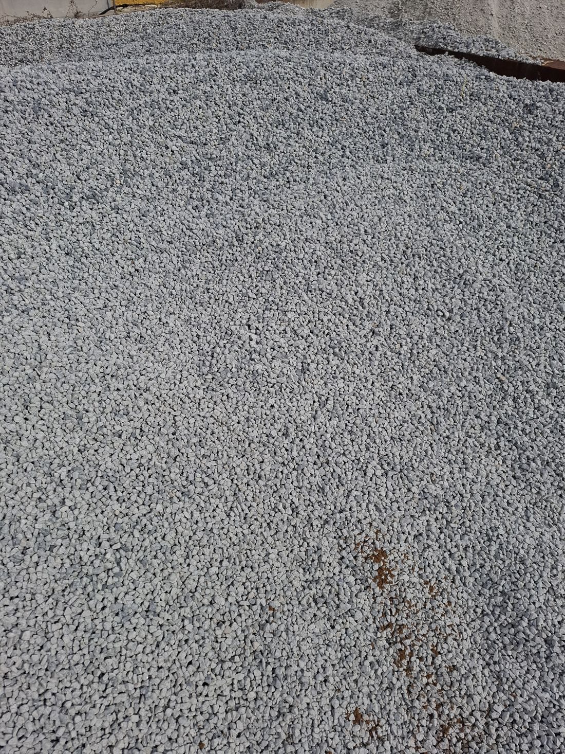 Blue Metal Aggregate (14mm) in use on a Perth job, supplied and delivered across Perth by Red Sand Supplies