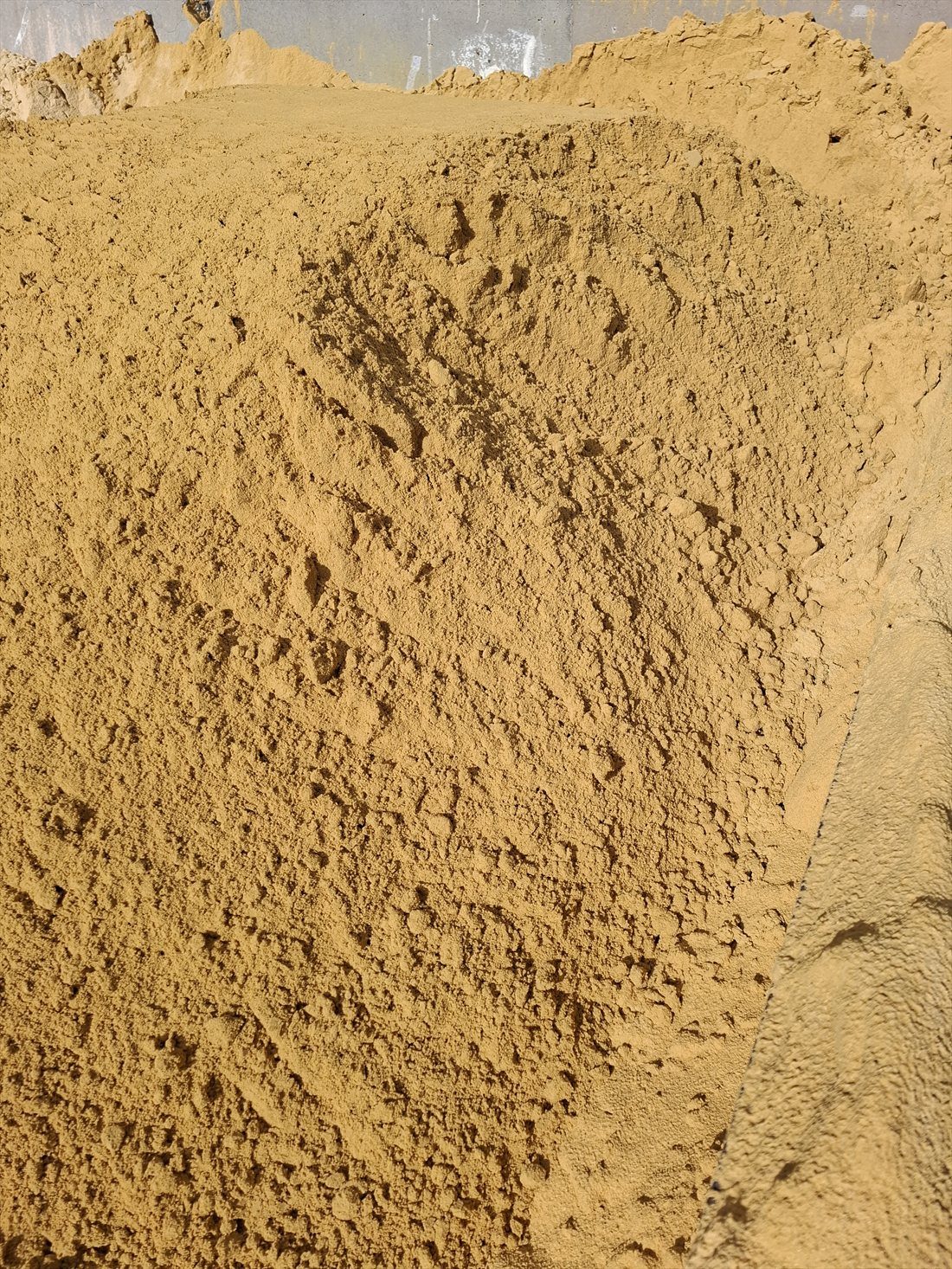 Brickies Sand in use on a Perth job, supplied and delivered across Perth by Red Sand Supplies