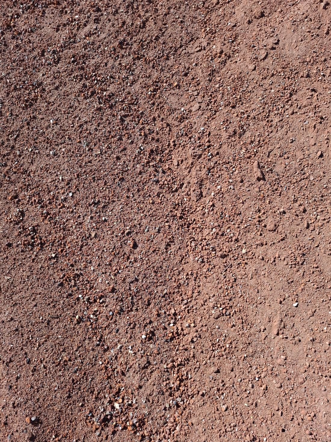 Red Brick Fines close up, supplied and delivered across Perth by Red Sand Supplies