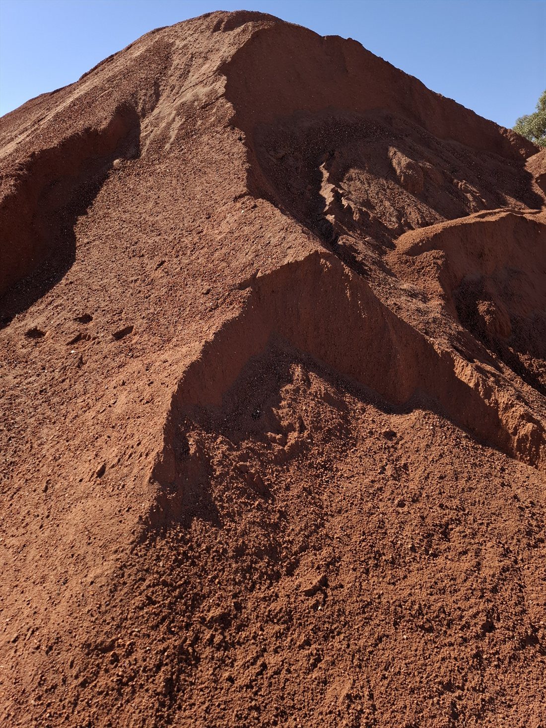 Red Brick Fines in use on a Perth job, supplied and delivered across Perth by Red Sand Supplies