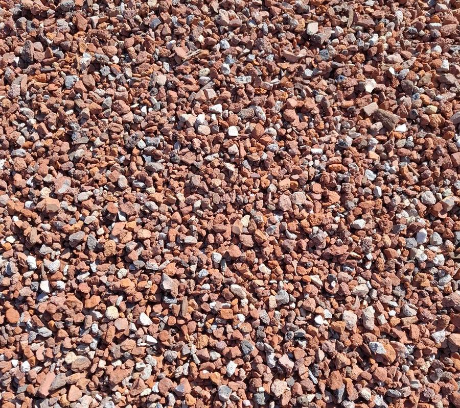 Red Crushed Brick (10-20mm) close up, supplied and delivered across Perth by Red Sand Supplies