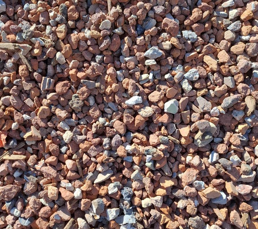Red Crushed Brick (10-35mm) close up, supplied and delivered across Perth by Red Sand Supplies