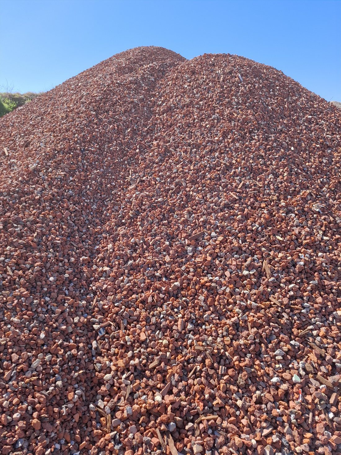 Red Crushed Brick (35mm) in use on a Perth job, supplied and delivered across Perth by Red Sand Supplies