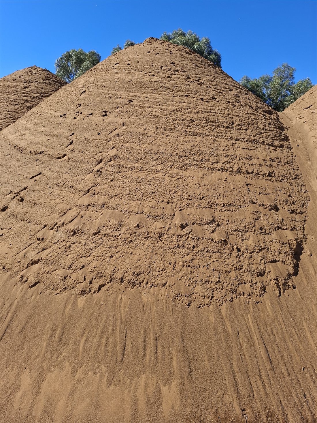 Spearwood Red (-5mm) in use on a Perth job, supplied and delivered across Perth by Red Sand Supplies